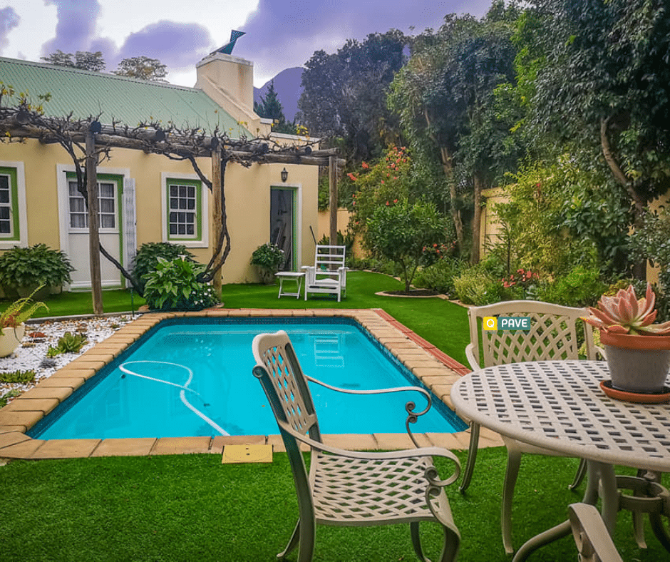 Paving and artificial grass around pool